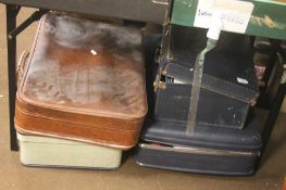 FOUR VINTAGE SUITCASES