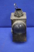 AN ANTIQUE RAILWAY LAMP