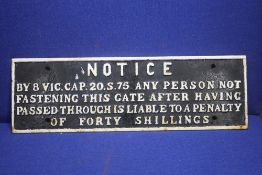A CAST IRON RAILWAY WARNING SIGN 
