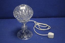 A GLASS TABLE LAMP