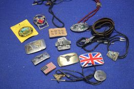 A QUANTITY OF ASSORTED BELT BUCKLES