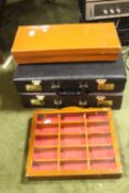 A PAIR OF BRIEFCASES, A SMALL VINTAGE LEATHER CASE A WALL MOUNTED DISPLAY CABINET ETC