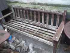 A HARD WOOD GARDEN BENCH