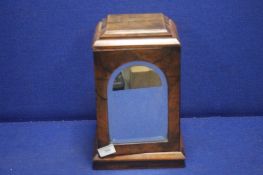 A SMALL WOODEN CABINET FITTED WITH THREE DRAWERS