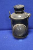 AN ANTIQUE RAILWAY LAMP