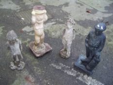 FOUR CONCRETE GARDEN STATUES