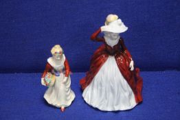 A COALPORT FIGURINE 