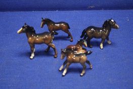 A COLLECTION OF 4 BESWICK PONIES