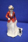 A ROYAL DOULTON FIGURINE 
