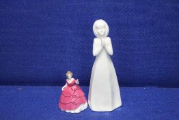 A ROYAL DOULTON FIGURINE 