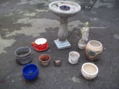 A SELECTION OF PLANTERS WITH A RESIN STATUE AND A RESIN BIRD BATH