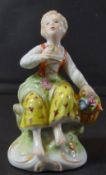 sitzendes Mädchen mit Blumenkorb "Sitzendorf", bemalt, H-9 cm