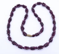 Granat Halskette mit Drehverschluss,L. 64cm, 58,9g.