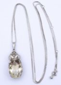 Art Deco Silber Anhänger mit einen oval facc. Citrin, an Silberkette, beide Silber 0.835, Kette L. 