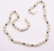 Perlenkette mit einer 585er WG Schließe und Diamanten, Kette DEFEKT, L. 49cm