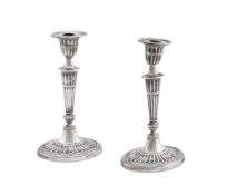 A PAIR OF EDWARDIAN SILVER OVAL CANDLESTICKS, THE GOLDSMITHS & SILVERSMITHS CO. LTD