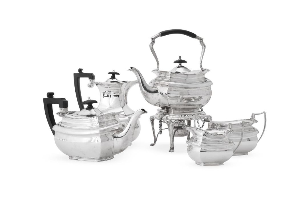 A MATCHED SILVER FIVE PIECE TEA SERVICE INCLUDING A KETTLE ON STAND, ELKINGTON & CO.