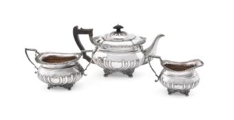 A MATCHED OBLONG BALUSTER THREE PIECE TEA SERVICE, THOMAS BRADBURY & SONS