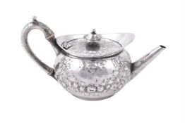 A GEORGE III SILVER CIRCULAR TEA POT, PAUL STORR
