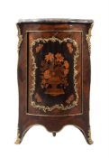 A marquetry and ormolu mounted corner cupboard
