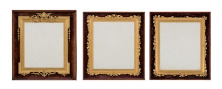 Y A pair of rosewood, velvet, giltwood and composition wall mirrors