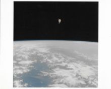 Bruce McCandless floats over Earth during the first untethered spacewalk, STS-41B, 7 Feb 1984