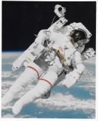 Bruce McCandless performs the first untethered spacewalk, STS-41B, 7 Feb 1984