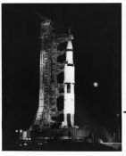 Three striking views of the Saturn rocket on the launch pad, Apollo 12, 14-24 Nov 1969