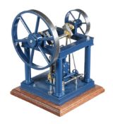 A well-engineered model of an over-type vertical live steam engine