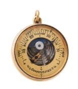 A RARE SMALL GOLD ANEROID POCKET BAROMETER WITH ALTIMETER