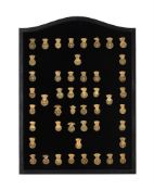 A COLLECTION OF FORTY-EIGHT ENGLISH GILT BRASS POCKET WATCH BACK COCKS