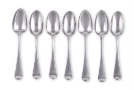 SEVEN MID GEORGIAN SILVER OLD ENGLISH LACE BACK TEA SPOONS