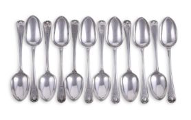 A SET OF TWELVE VICTORIAN SILVER FIDDLE, THREAD & SHELL DESSERT SPOONS