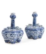 A PAIR OF CHINESE 'BAMBOO, PLUM BLOSSOM, CHRYSANTHEMUM AND ORCHID' BLUE AND WHITE 'CROCUS' VASES