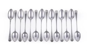 A SET OF TWELVE VICTORIAN SILVER OLD ENGLISH FEATHER EDGE DESSERT SPOONS, GEORGE ADAMS FOR CHAWNER &