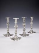 A SET OF FOUR LATE GEORGE II CAST SILVER CANDLESTICKS, JOHN CAFE