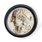 A PAINTED PLASTER ROUNDEL WITH CLASSICAL FEMALE PROFILE RELIEF, PROBABLY EARLY 19TH CENTURY