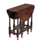 AN UNUSUAL CHARLES II SOLID FRUITWOOD OVAL DROP LEAF TABLE, CIRCA 1680