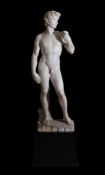 AFTER MICHELANGELO (ITALIAN, 1475-1564), A CARVED MARBLE FIGURE OF 'DAVID', EARLY 20TH CENTURY