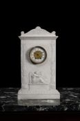 A CONTINENTAL CARRARA MARBLE CASED CLOCK, IN THE MANNER OF BERTEL THORVALDSEN, EARLY 19TH CENTURY