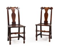 A PAIR OF GEORGE II OAK SIDE CHAIRS, CIRCA 1730