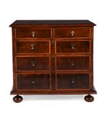 A WILLIAM III WALNUT AND HOLLY BANDED CHEST OF DRAWERS, CIRCA 1700