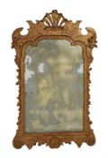 A GEORGE II GILTWOOD AND GESSO WALL MIRROR, CIRCA 1735