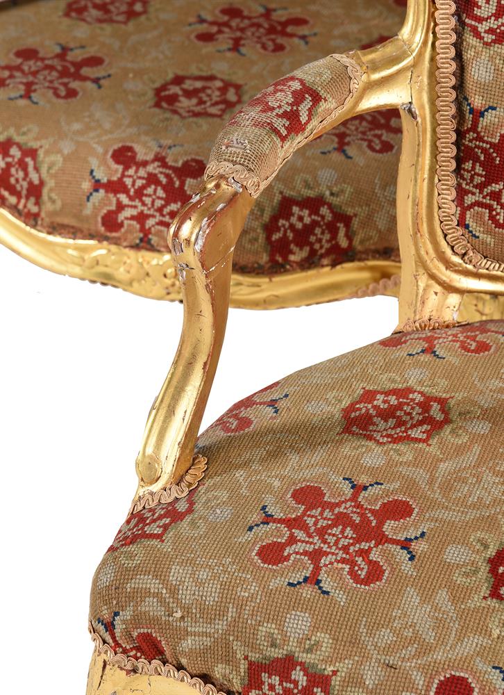 A SET OF SIX GEORGE III GILTWOOD AND TAPESTRY UPHOLSTERED ARMCHAIRS IN LOUIS XV STYLE - Image 3 of 4