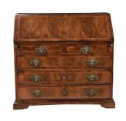 A CONTINENTAL WALNUT AND INLAID BUREAU