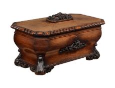 A VICTORIAN OAK SARCOPHAGUS SHAPED CELLARET