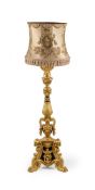 A GILTWOOD AND EBONISED TORCHERE IN 18TH CENTURY ITALIAN STYLE