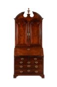 A GEORGE II MAHOGANY BUREAU BOOKCASE