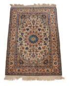 A PART SILK RUG IN KASHAN STYLE