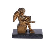 FRANZ ANTON VON ZAUNERA GILT SPELTER MODEL OF A PUTTO READINGEARLY 19TH CENTURYInscribed ZAUNER F